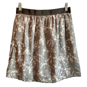 Grey skirt with cream pattern.
